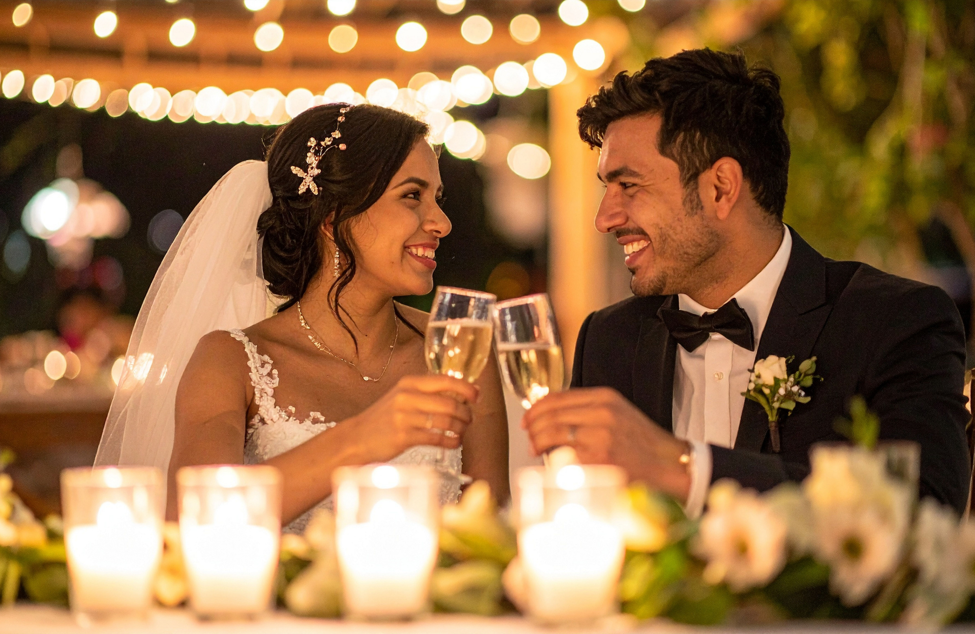 A garden reception under string lights